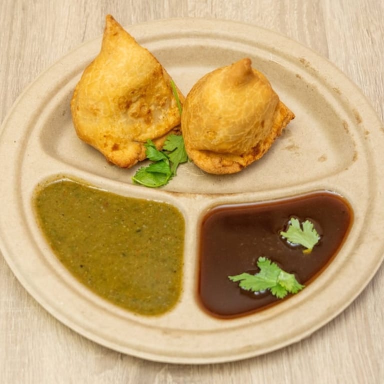 Savor Our Crispy Samosas